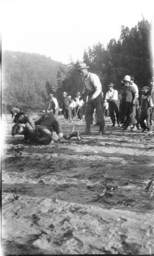 Johnsons: Stick game in 1926. One of the players is James Donnelly. An early print exists with a label on it, which is clearly in Mrs. Ruth K. Roberts' hand, reading:--James Donnelly