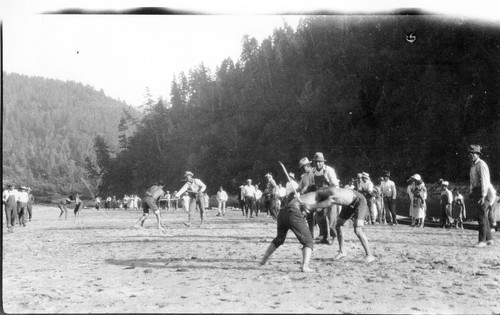 Johnsons: Stick game in 1926. An early print exists, labelled in what is probably Mr. Roberts' hand, reading:--Stick game Johnsons 1926