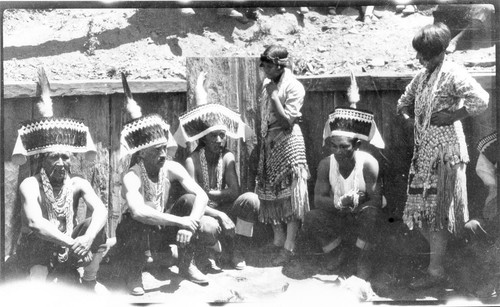 Pecwan: Jump Dance of 1926. Dancers in pit, including girls