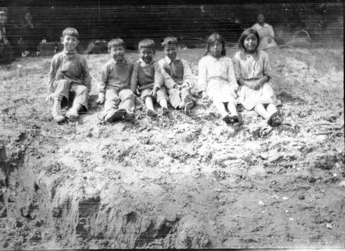 Harry Roberts at age seven to ten with a group of Indian children