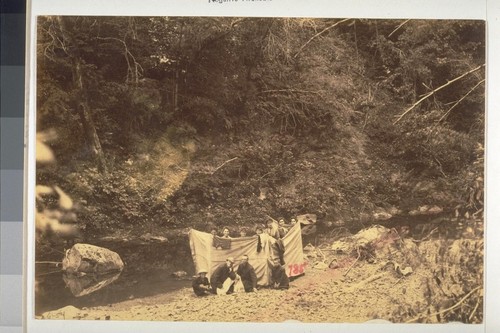 Seven ladies in improvised dressing room near a stream in Sonoma County