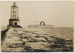 Light house at end of Government Breakwater, S.S. Yale passing out, San Pedro, Cal.