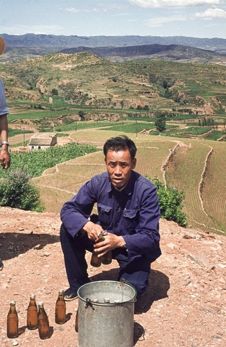 Local Cadres Bringing Cold Drinks to Delegation During Long Hike