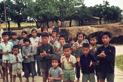 Barefoot Kids Saying Hello