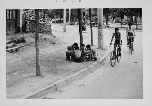 Children Playing by the Street