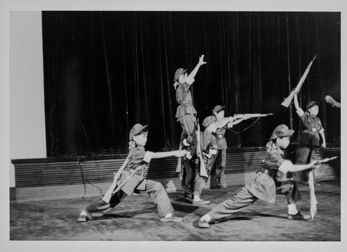 Young Students Performing Revolutionary Routine