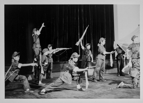 Young Students Performing Revolutionary Routine