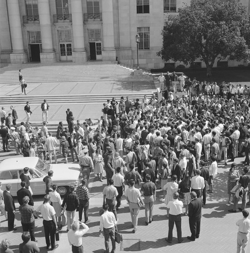 The police car arrives at CORE table on Sproul Hall to pick up Jack Weinberg