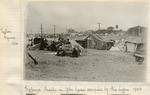 Refugee shacks in Lobos Square.