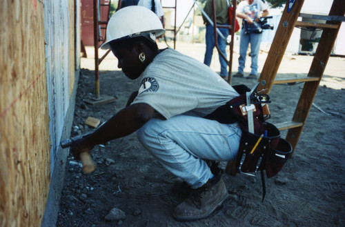 Trainee at a Habitat for Humanity construction site