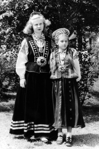 Cousins in traditional Latvian costume