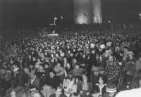 Evening view of a crowd at the Washington Monument