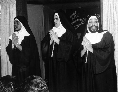 The Girlfriends dressed in nun habits