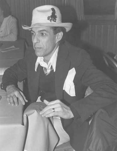 Man in suit and hat