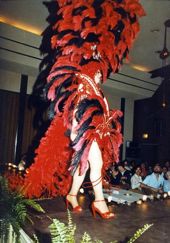Rachel in an elaborate feather costume