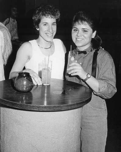 Two women at a bar table