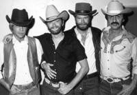 Four men in western wear