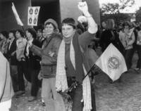 Two women arm-in-arm