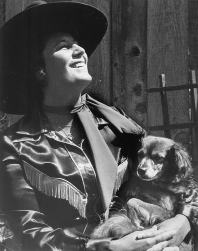 Darlene Lutz holding a dog