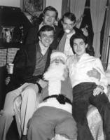 Santa Claus and four men