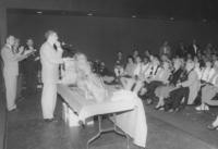 Man standing at lectern