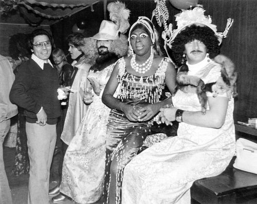 Billy DeFrank sitting with other female impersonators