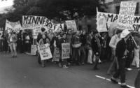 Marchers with signs and banners