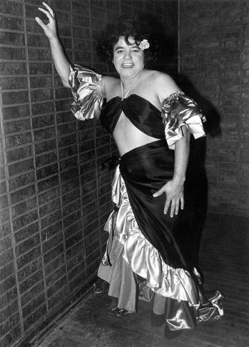 Female impersonator wearing a Latin dancer costume