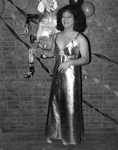 Female impersonator in evening gown