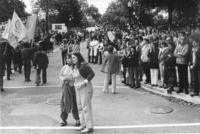 Spectators watching marchers