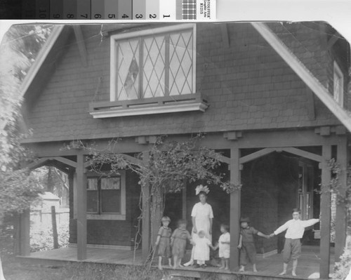 Children on porch of Cebalo Family residence, 332 Elm St., ca. 1917