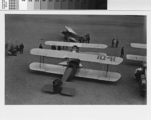 Swallow biplane and Pacific Air Transport biplane on airfield at Mills Field, ca. 1927