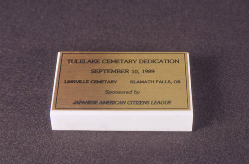 Paperweight memorializing the Tule Lake Cemetery Dedication