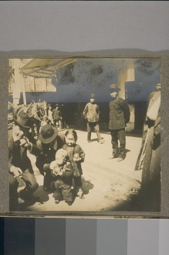 [Children with adults, Chinatown.]