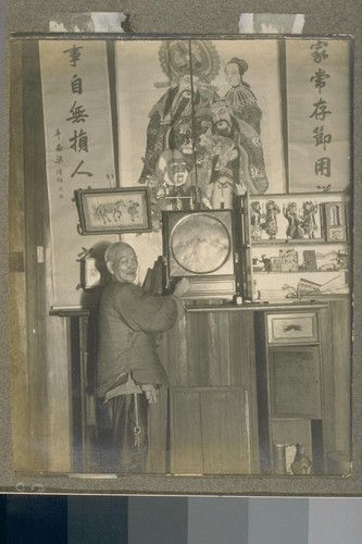 [Unidentified man. Interior, Chinese church or temple?]