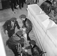 Arrested students being loaded into sherriff's bus before being taken to jail