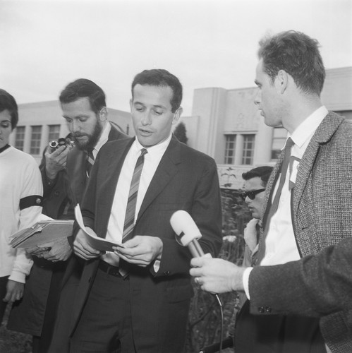 L to R. Professor Edward Sampson, Steve Weissman and Mario Savio reading a statement at a press conference before court opened