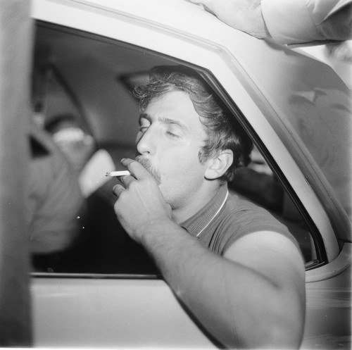 Jack Weinberg in police car under arrest