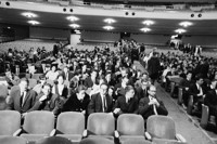 The defendants seated in the Berkeley Muny Theater which is a courtroom for this hearing
