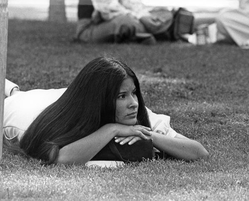 Student on campus lawn