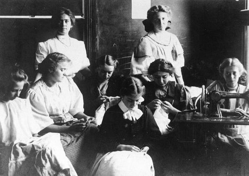 Female students sewing by hand