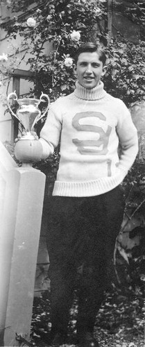 San Jose State Normal School student with trophy