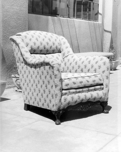 Upholstered flower patterned chair