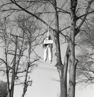 An effigy of Hunter S. Thompson hanging from a tree