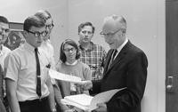 Students gather with President Clark