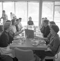 Alpha Omicron Pi women enjoy a meal together