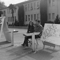 Two students protesting the draft