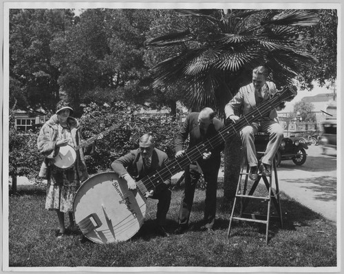 Sherman, Clay and Co. publicity photo with giant banjo [ca. 1925]