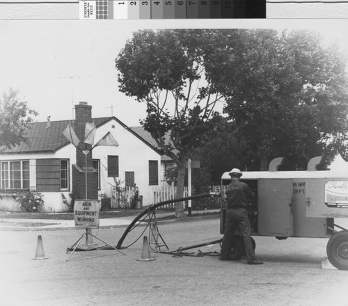 Men and Equipment Working (1960s)