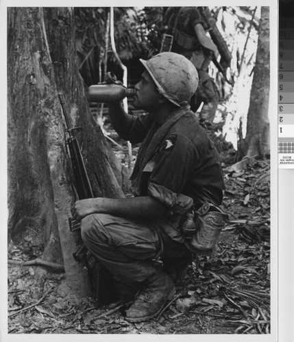 Trooper drinking from canteen - Vietnam